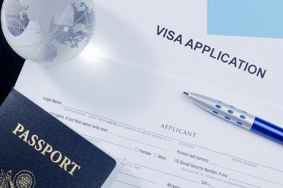 Directly above photograph of an application for a visa. ** Note: Shallow depth of field